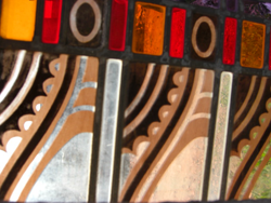 Detail van brandschildering.